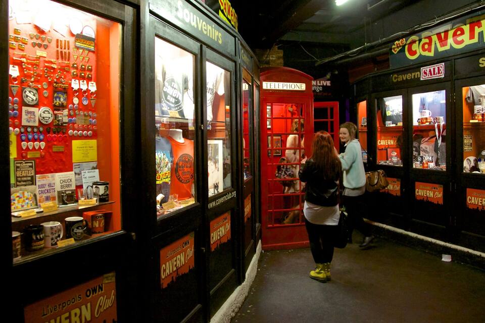 A souvenir shop with memorabilia and a red telephone booth.