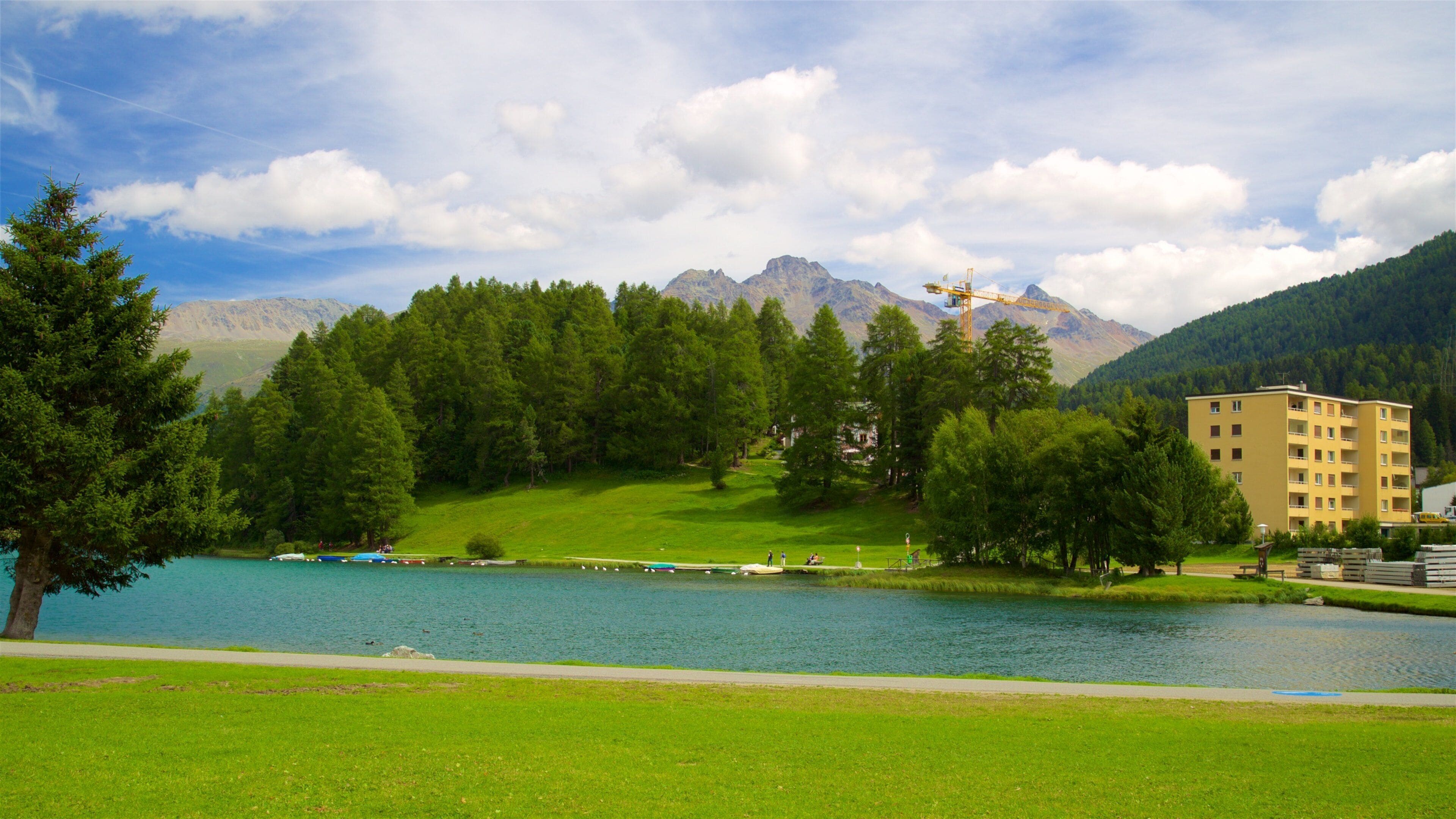 Lake St. Moritz featuring a lake or waterhole and a park