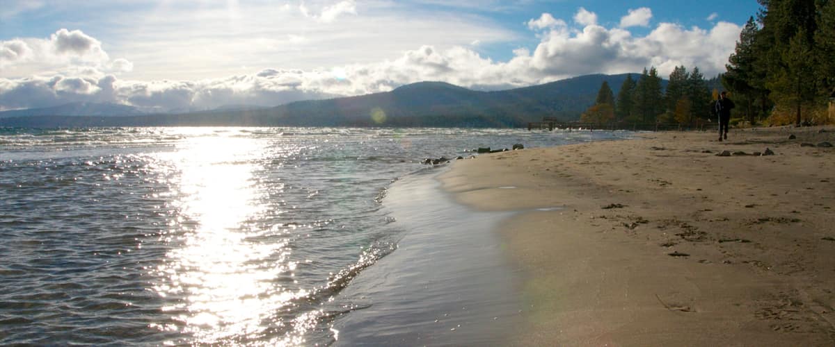Kings Beach State Park showing landscape views and a sandy beach
