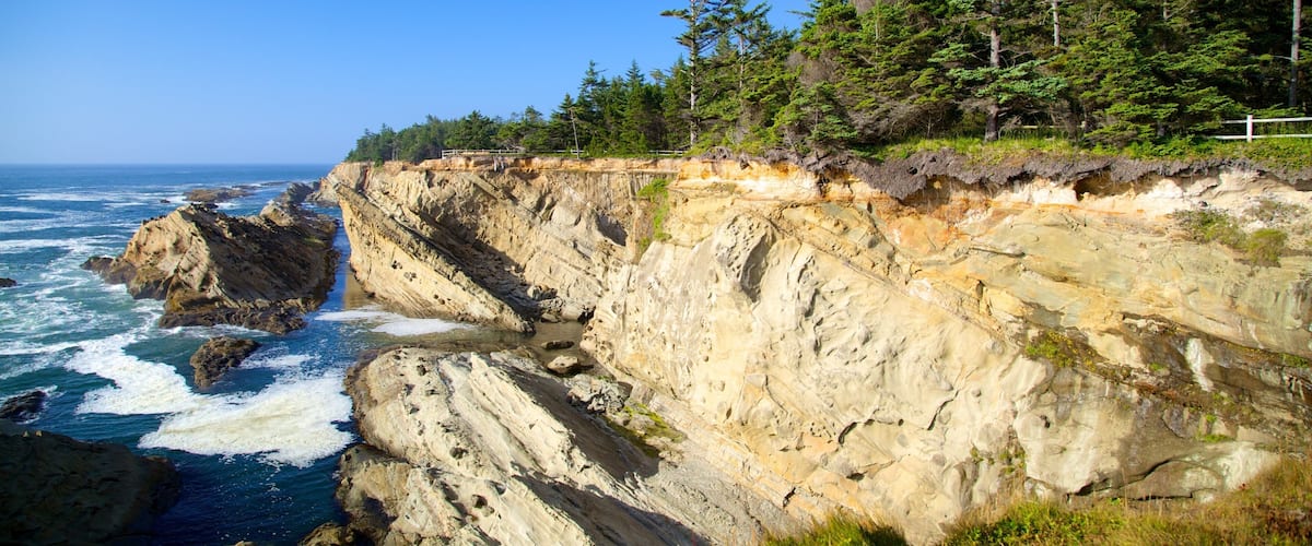 Shore Acres State Park showing rocky coastline and landscape views