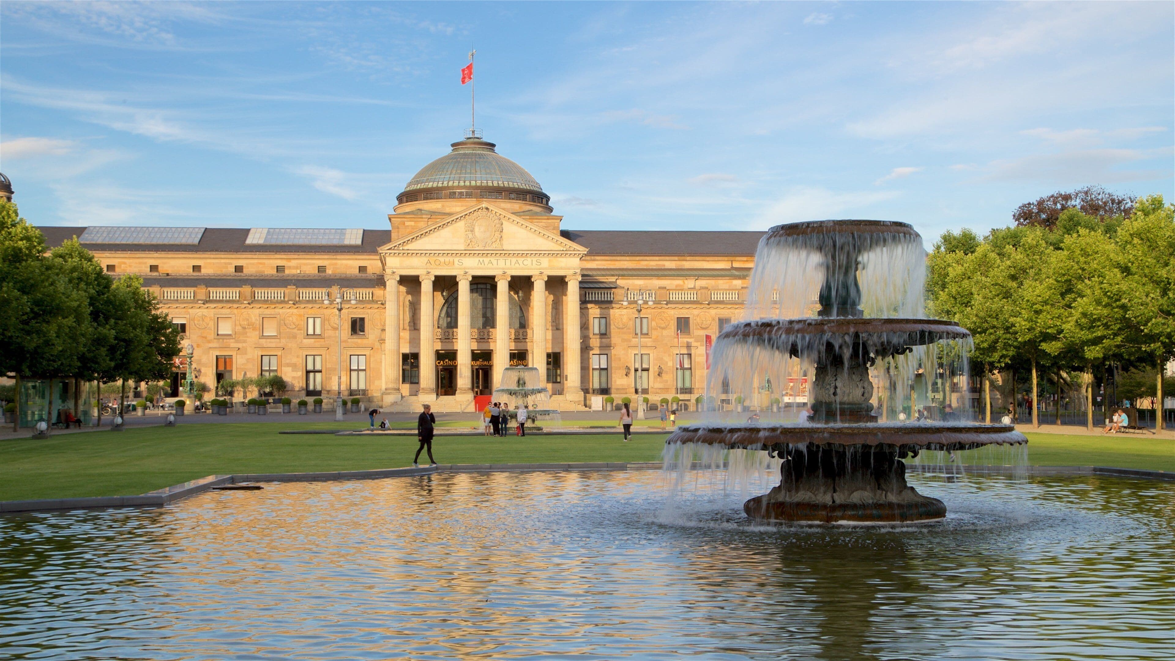 Kurhaus which includes a fountain, heritage architecture and a garden