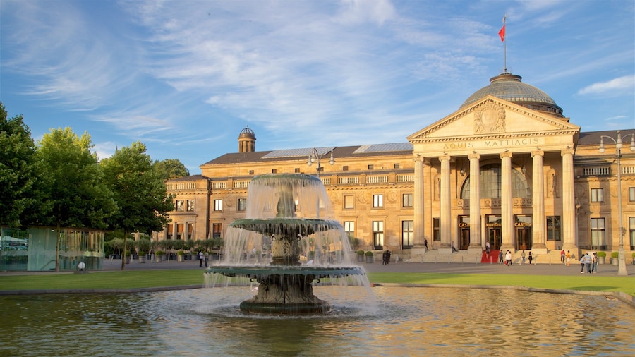 Kurhaus featuring a fountain, heritage architecture and a garden