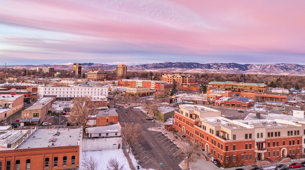 Fort Collins downtown in northern Colorado, aerial view with Rocky Mountains in background
