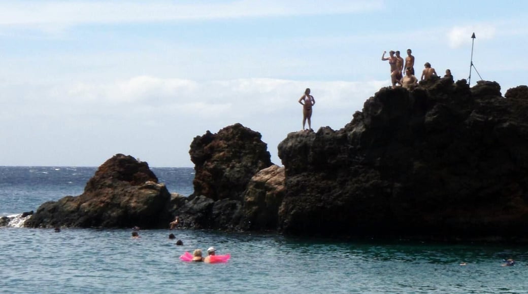 This black rock sits at the end of Kaanapali Beach. Fun for jumping off of, but be sure to keep your legs crossed. :)