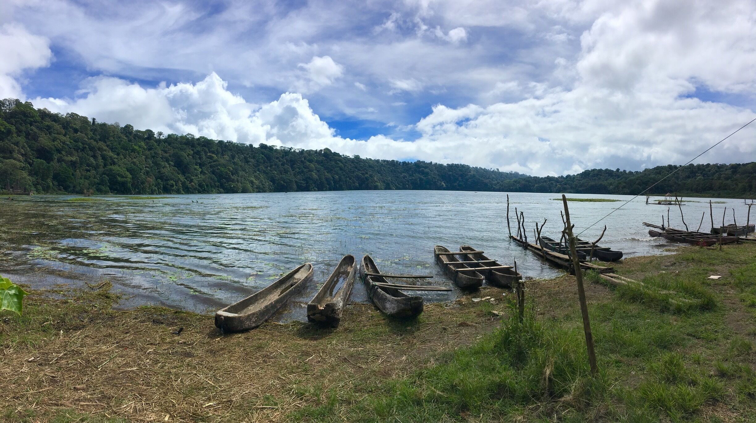 Tamblingan Lake near Munduk. 7 people on this double-canoe: a little bit risky... At the end of the crossing, we had a lot of water in the canoe... and a good story to tell...