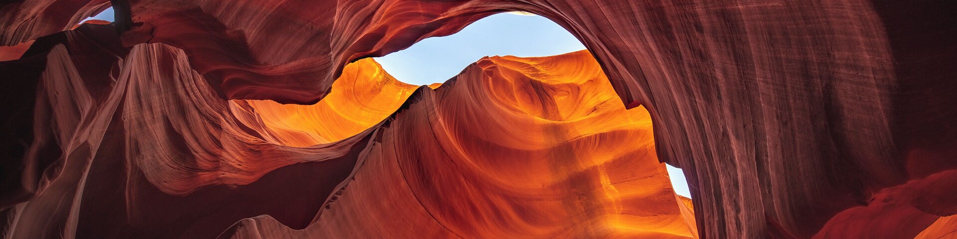 I went through an entire memory card in this canyon...yes it's that cool of a place to go.
This time I decided to try Lower Antelope Canyon. Last time I didn't because I figured it wasn't going to be anything missed after I went to Upper Antelope Canyon. Other than the name and the fact that they are both slot canyons they couldn't be any more different. Upper is all about the light rays, large rooms, and really tall walls. lower is all about reflected light and sweeping lines.
I would recommend going to Upper Antelope Canyon at 11:30-12:30. And lower 9:30-10:30 or 3:30-5:30. Go to upper during the middle of the day for the light rays and lower when the sun is at more of an angle so you get more reflected light.
