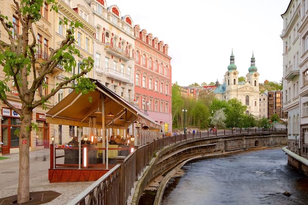 Church of St. Mary Magdalene showing a river or creek and a city