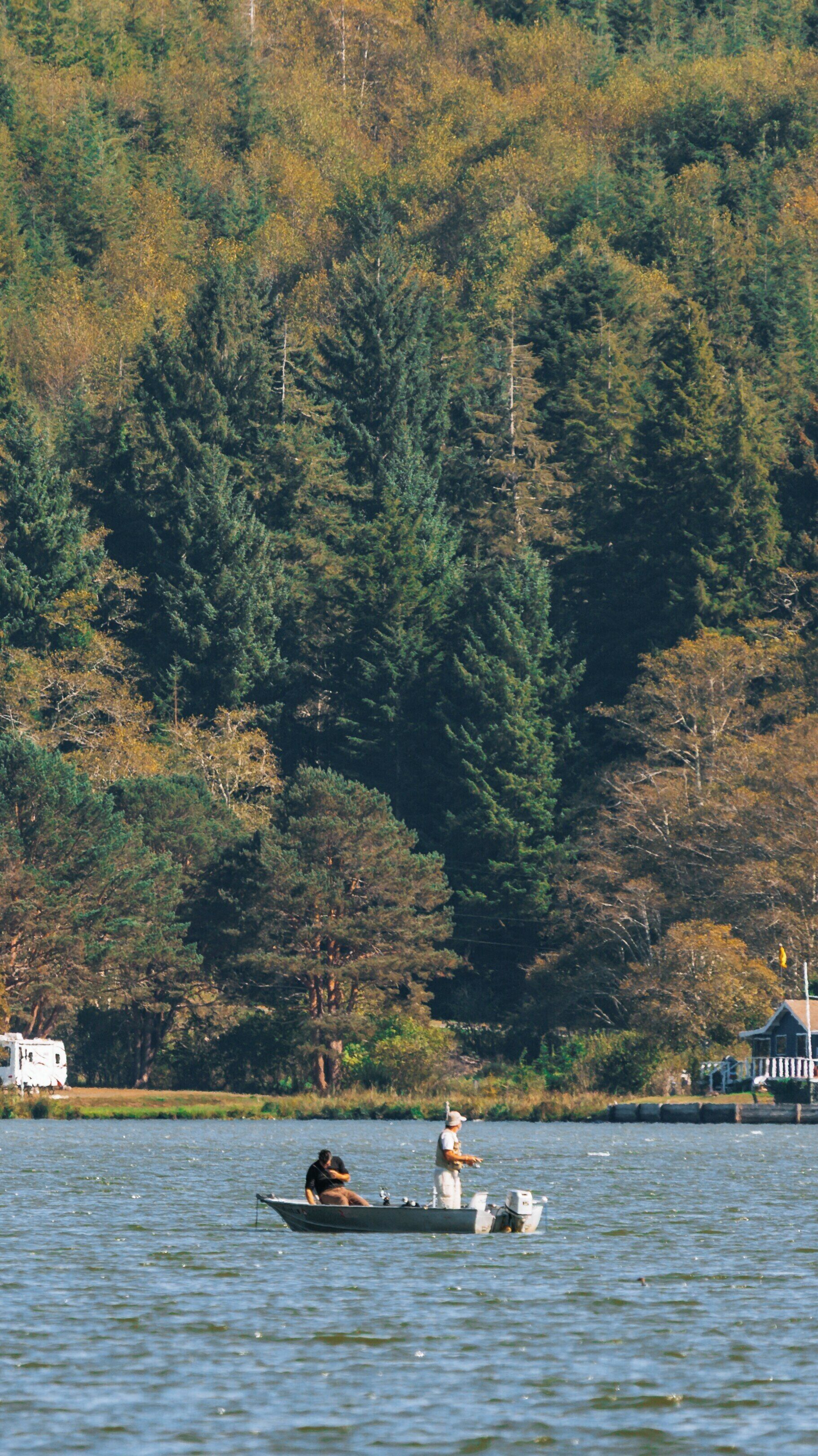 Exploring the scenic beauty of Devil's Lake State Recreation Area in Lincoln City, Oregon with a peaceful boat outing