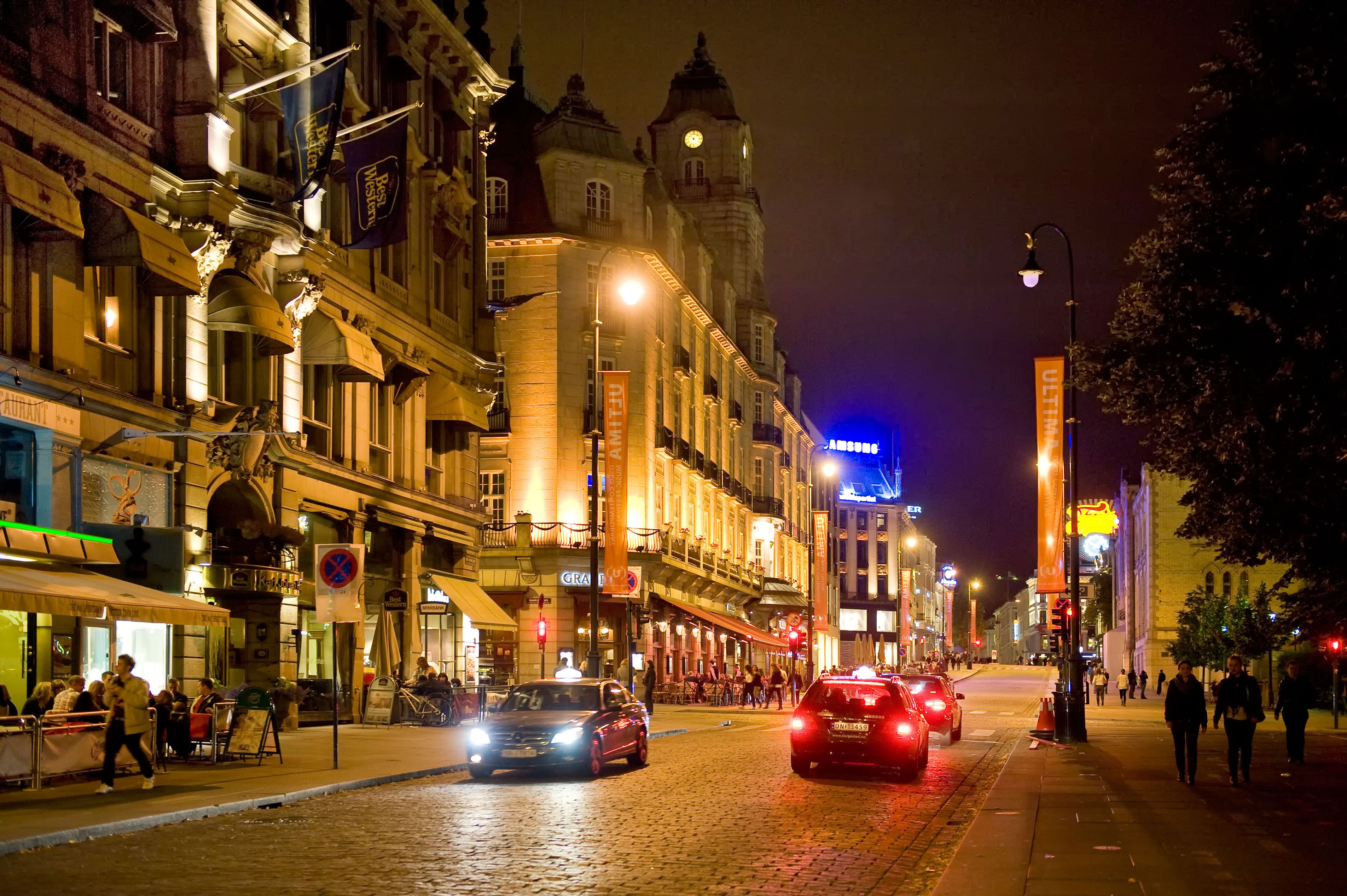 Street scene at night Karl Johan Gate Oslo Norway