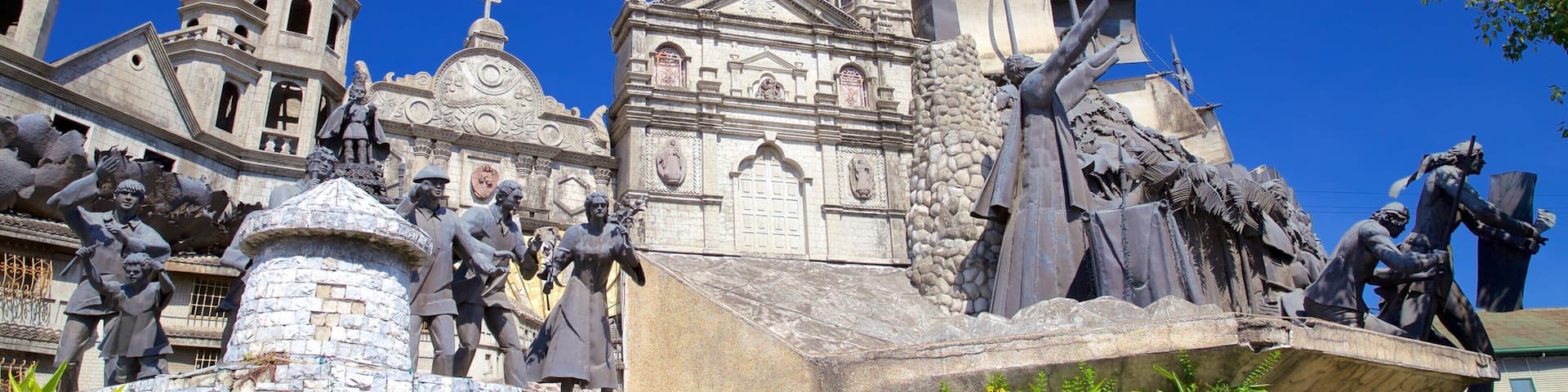 Heritage of Cebu Monument which includes religious aspects, heritage architecture and a statue or sculpture