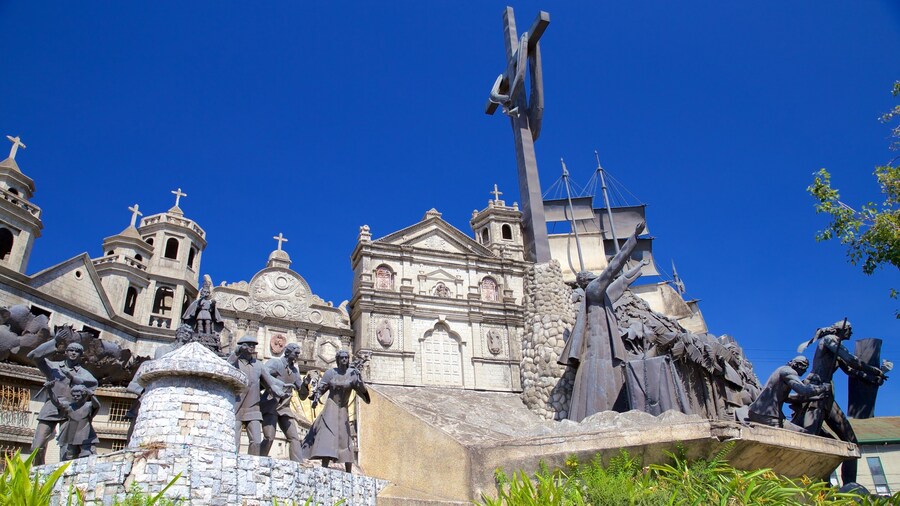 Heritage of Cebu Monument which includes religious aspects, heritage architecture and a statue or sculpture