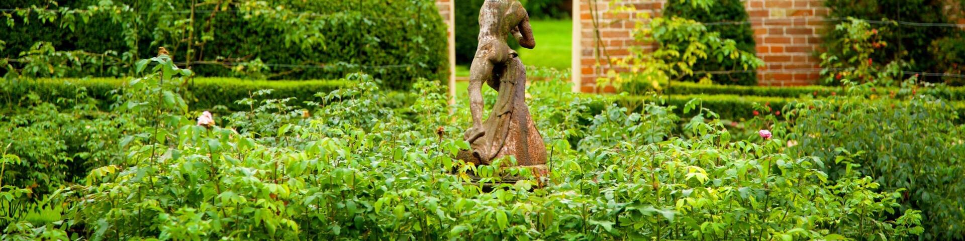 Bridge End Gardens which includes a garden and a statue or sculpture