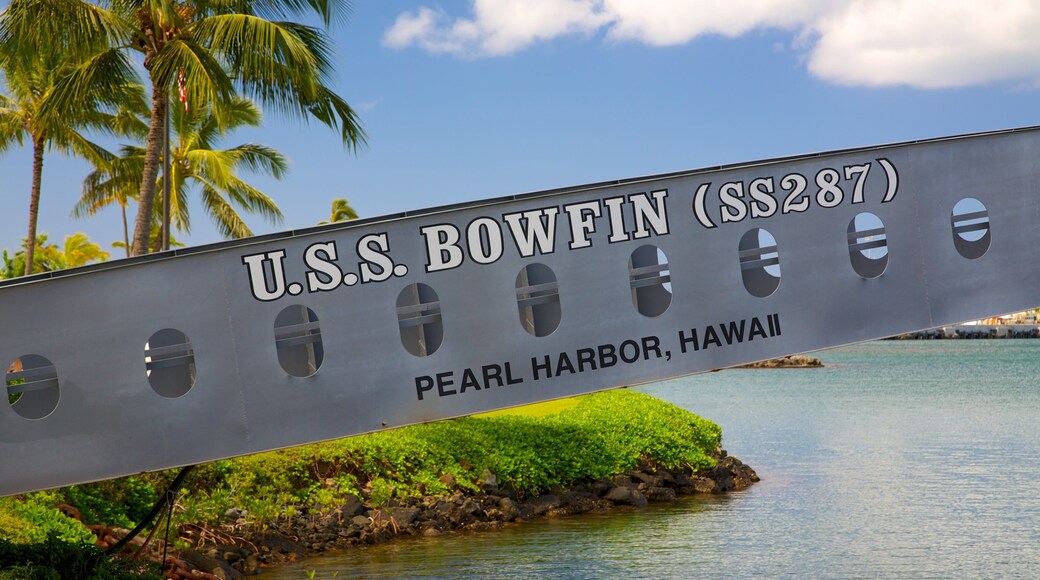 USS Bowfin Submarine Museum and Park showing signage, tropical scenes and general coastal views