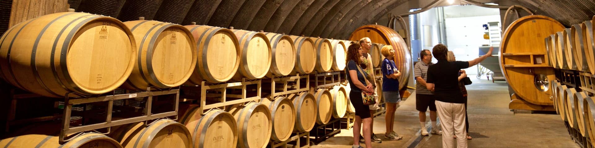 Oliver Winery featuring interior views as well as a small group of people