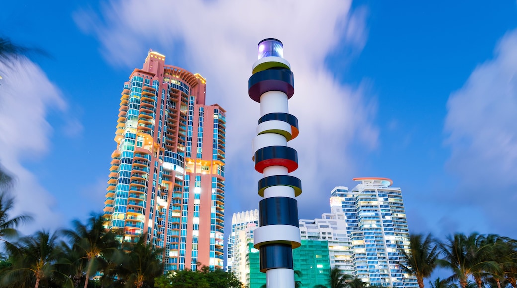 Travel destination. South Pointe Park. Landmark architecture. Lighthouse sculpture. Night city. Urban park in Miami Beach. South beach architecture. Famous monument in South Pointe Park, Florida