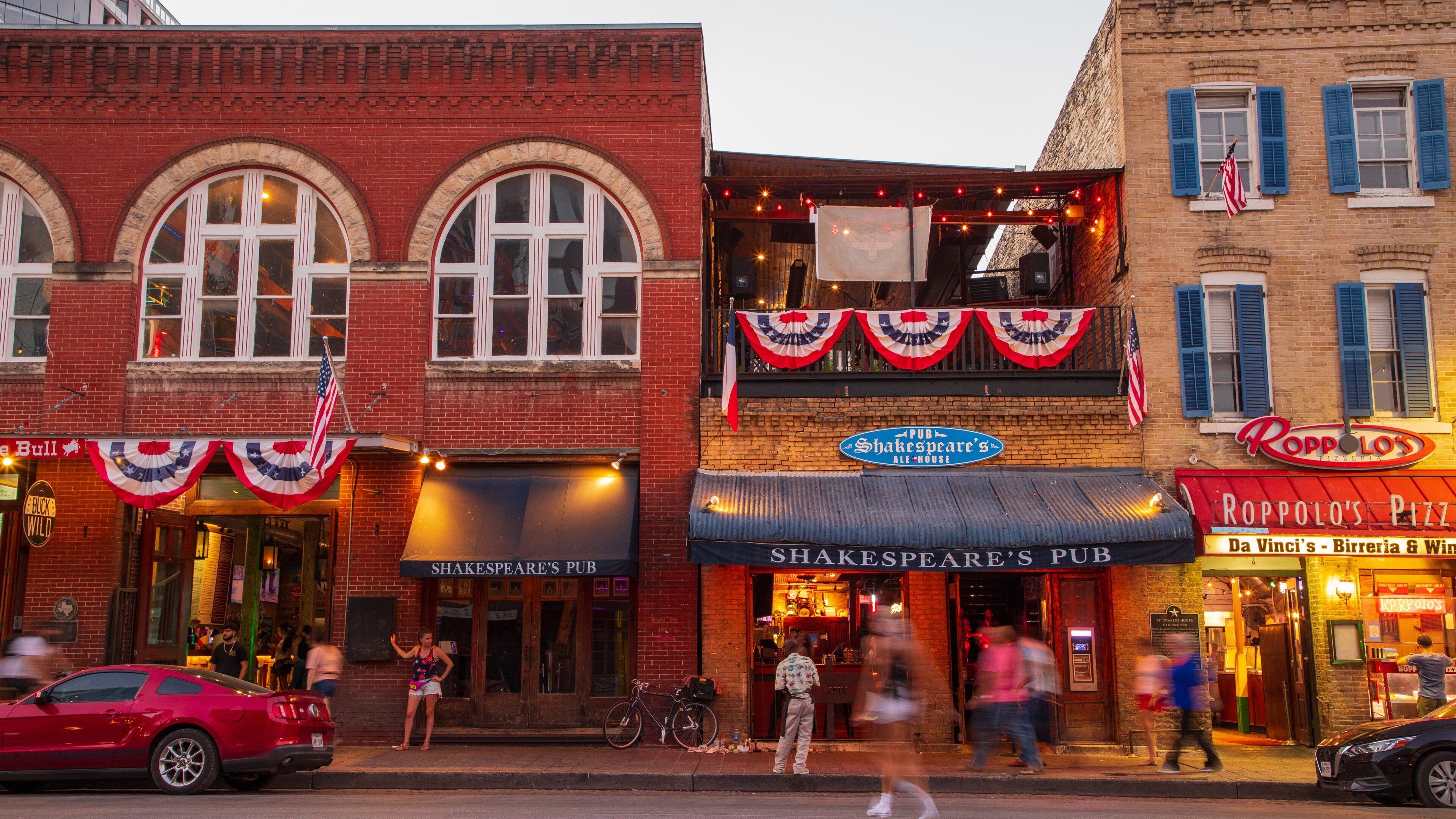 Sixth Street showing street scenes and night scenes