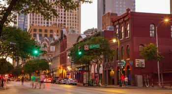 Sixth Street showing a city and a sunset