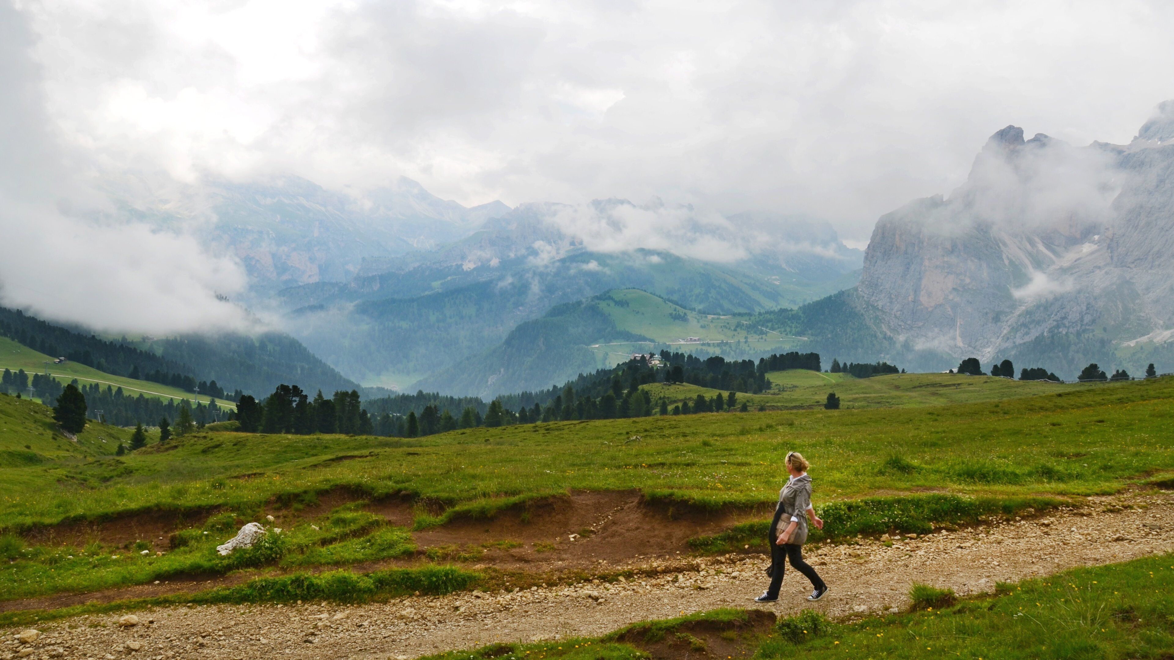 Ciampino-Sella Ski Area featuring landscape views and tranquil scenes as well as an individual femail