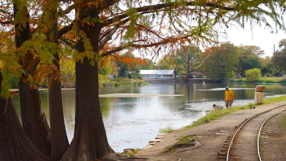 Exploring the beautiful Landa Park in New Braunfels, Texas with autumn foliage and peaceful waters