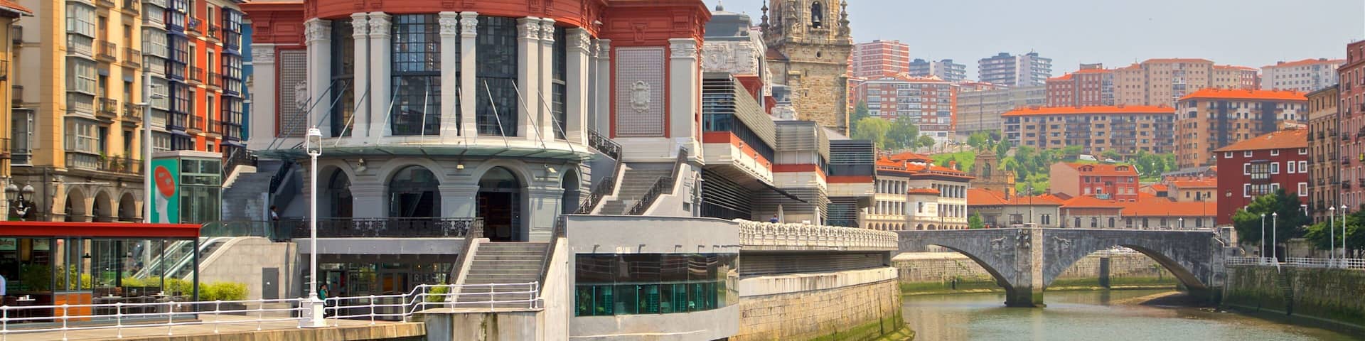Ribera Market which includes a river or creek, a city and heritage architecture