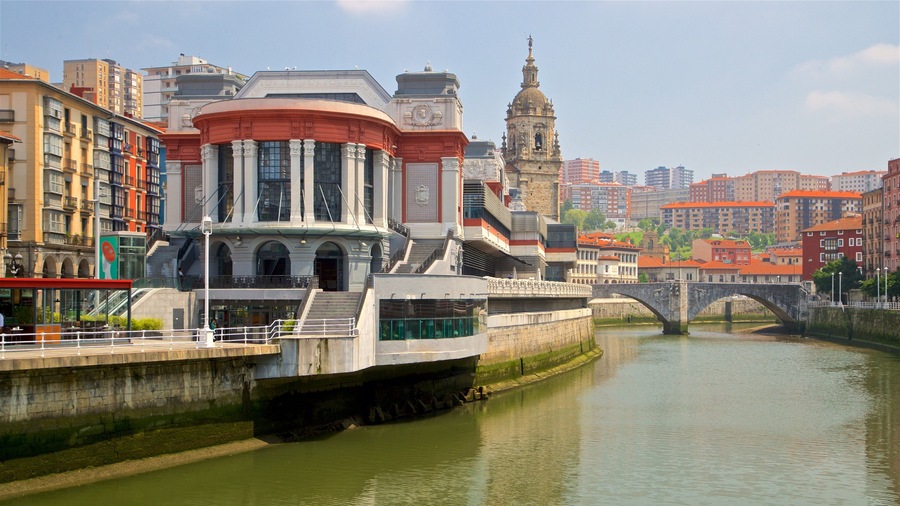 Ribera Market featuring a river or creek, a city and heritage architecture