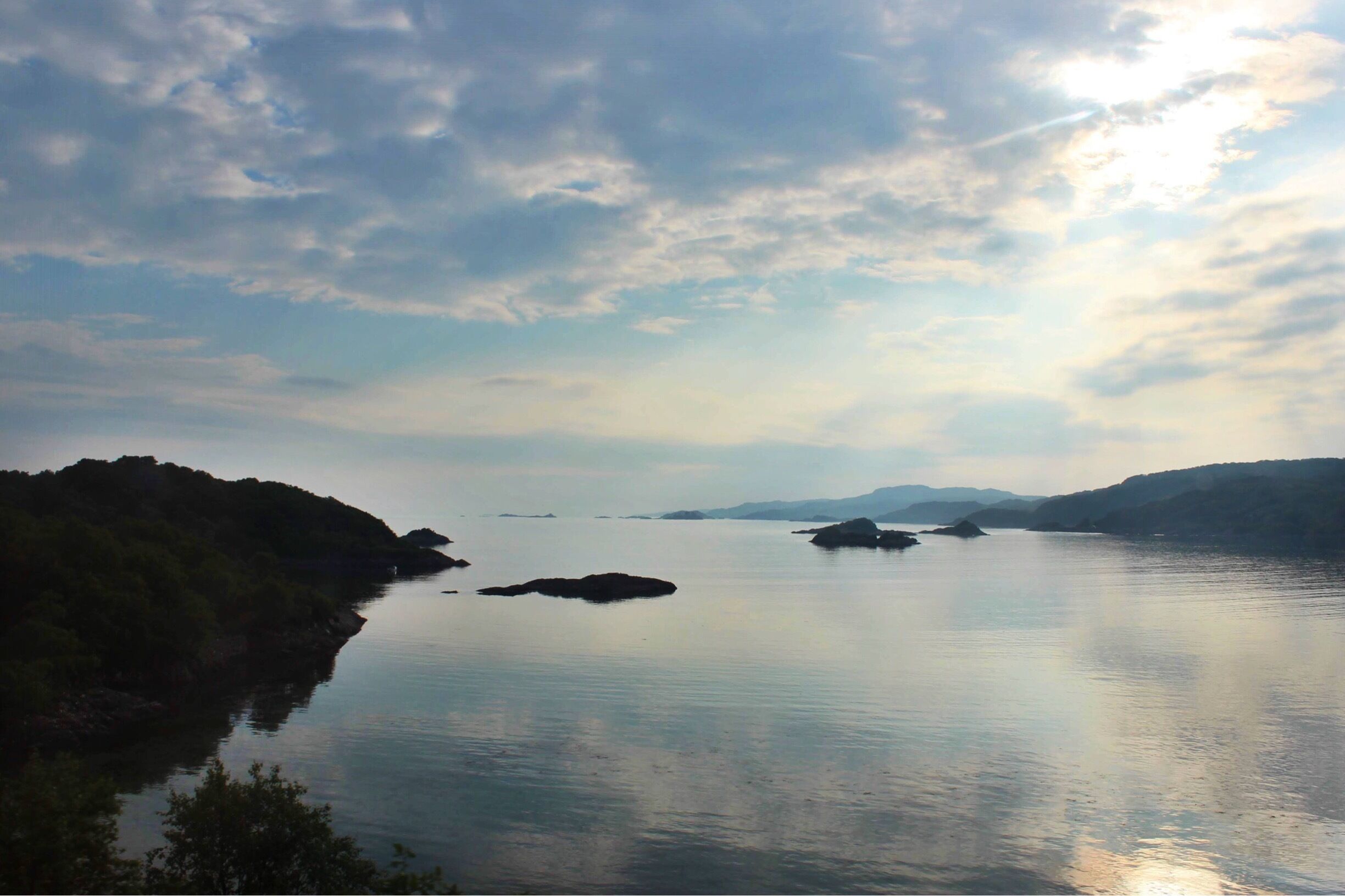 One of the most magical aspects of Scotland is how quickly the land will change from one hour to the next. How it can go from land and loch, to the sky pouring down and filling the lowlands with its glory. Travel from Fort William to Mallaig, then go back again and see how the land transforms. #scotland #highlands #unitedkingdom #landscape