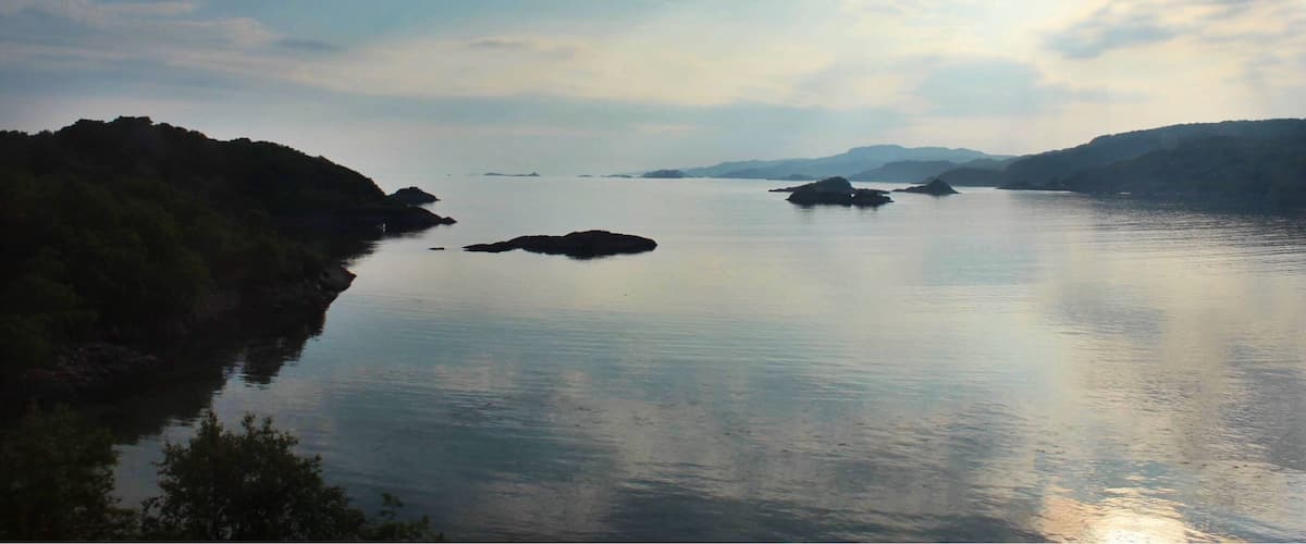 One of the most magical aspects of Scotland is how quickly the land will change from one hour to the next. How it can go from land and loch, to the sky pouring down and filling the lowlands with its glory. Travel from Fort William to Mallaig, then go back again and see how the land transforms. #scotland #highlands #unitedkingdom #landscape