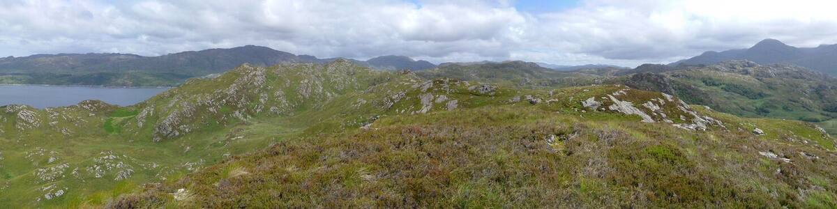 Ardnish Peninsula, with Loch Ailort, Sound of Arisaig, Loch nan Uamh and much more visible. 360 degrees panoramic image made from own photos using hugin and enblend, slightly retouched filling gaps.