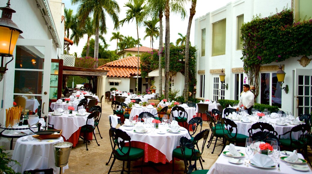 Worth Avenue featuring dining out as well as an individual male