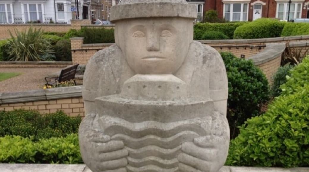 He looks so proud of the model he made lol