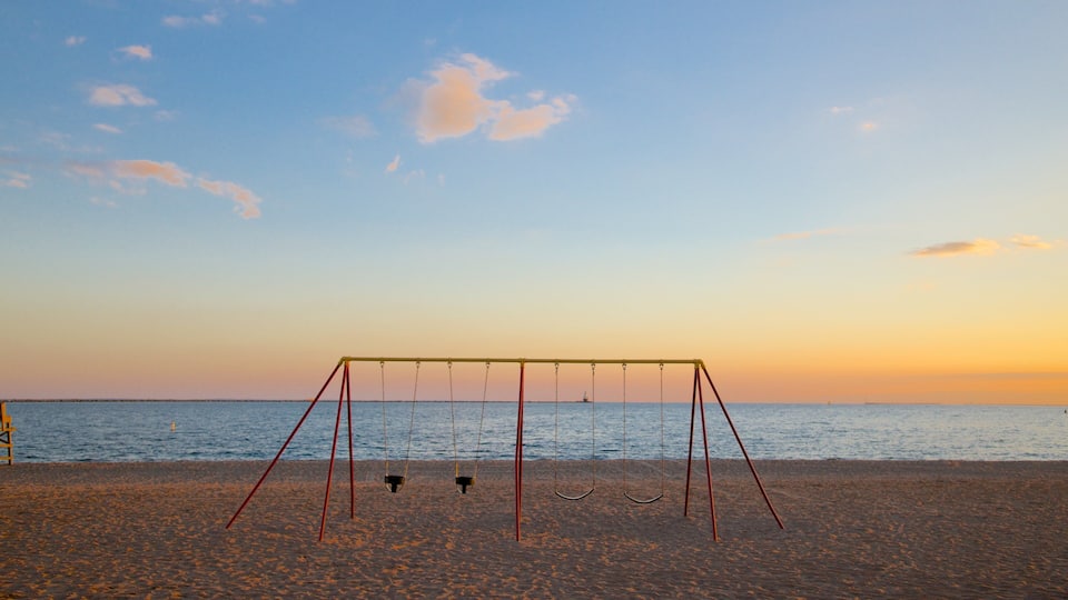 Lighthouse Point Park which includes a sandy beach