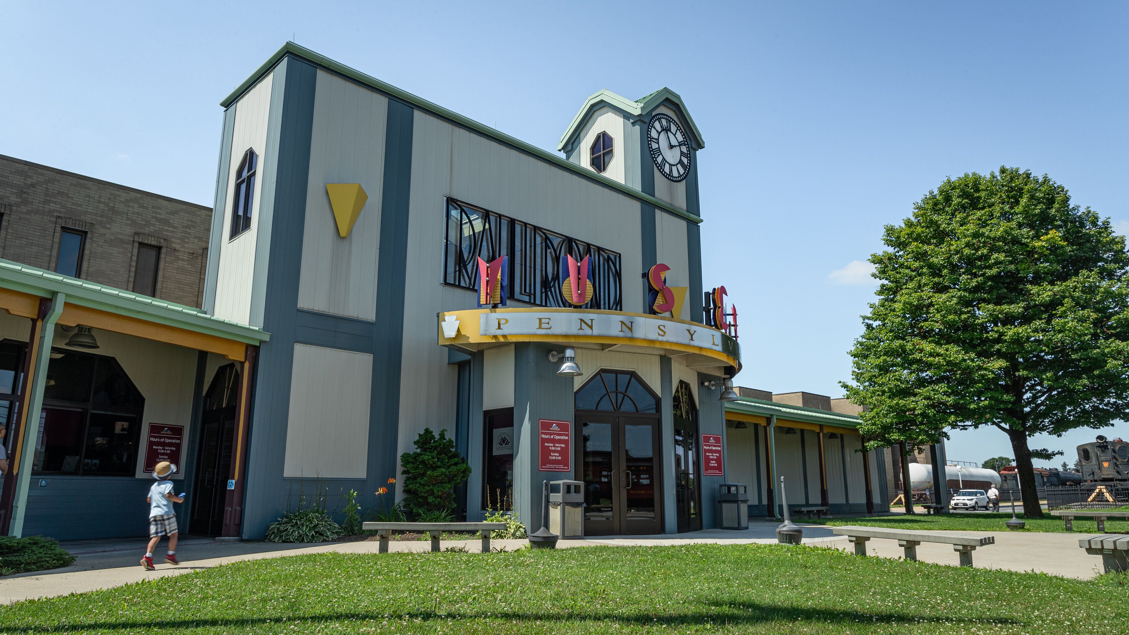 A building with a clock tower and a sign reading "PENNSYLVANIA".