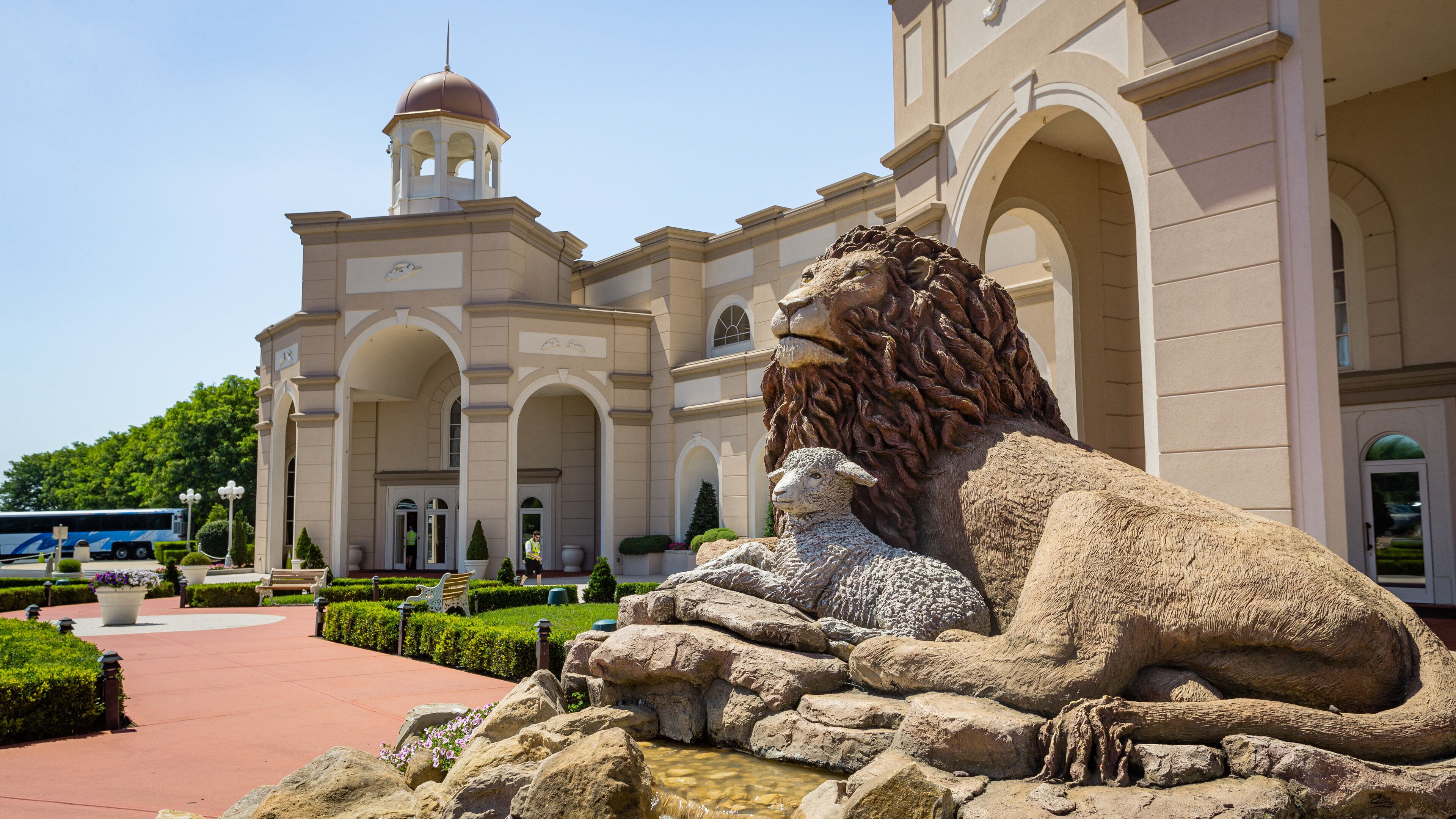 Sight and Sound Theatre showing outdoor art and a statue or sculpture