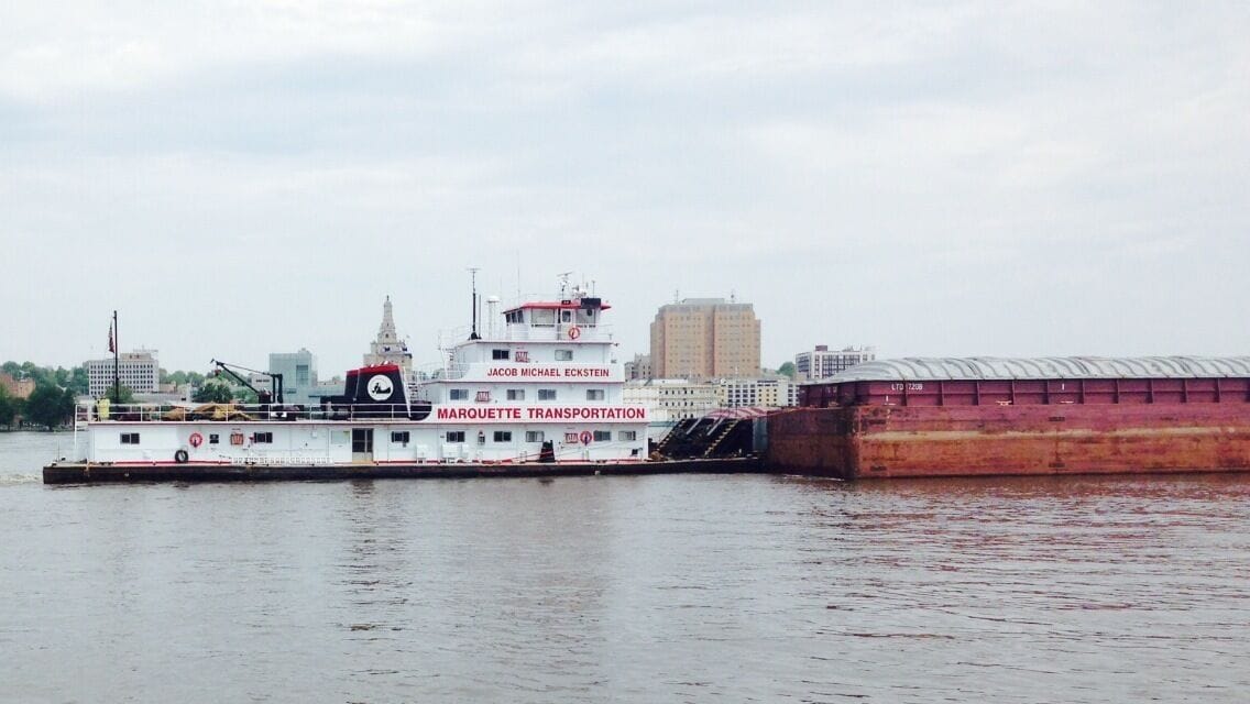 Barge going down the MISSISSIPPI RIVER