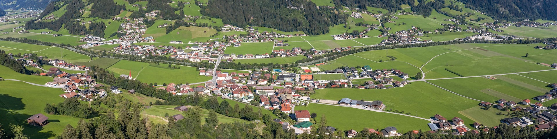 360 Panorama Aerial view of Zillertal Valley village in sunny summer afternoon in Tyrol Austria