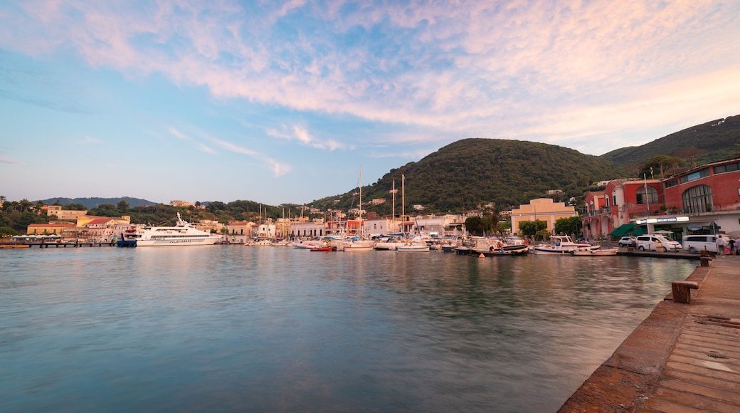 Ischia Port which includes a bay or harbor and a sunset