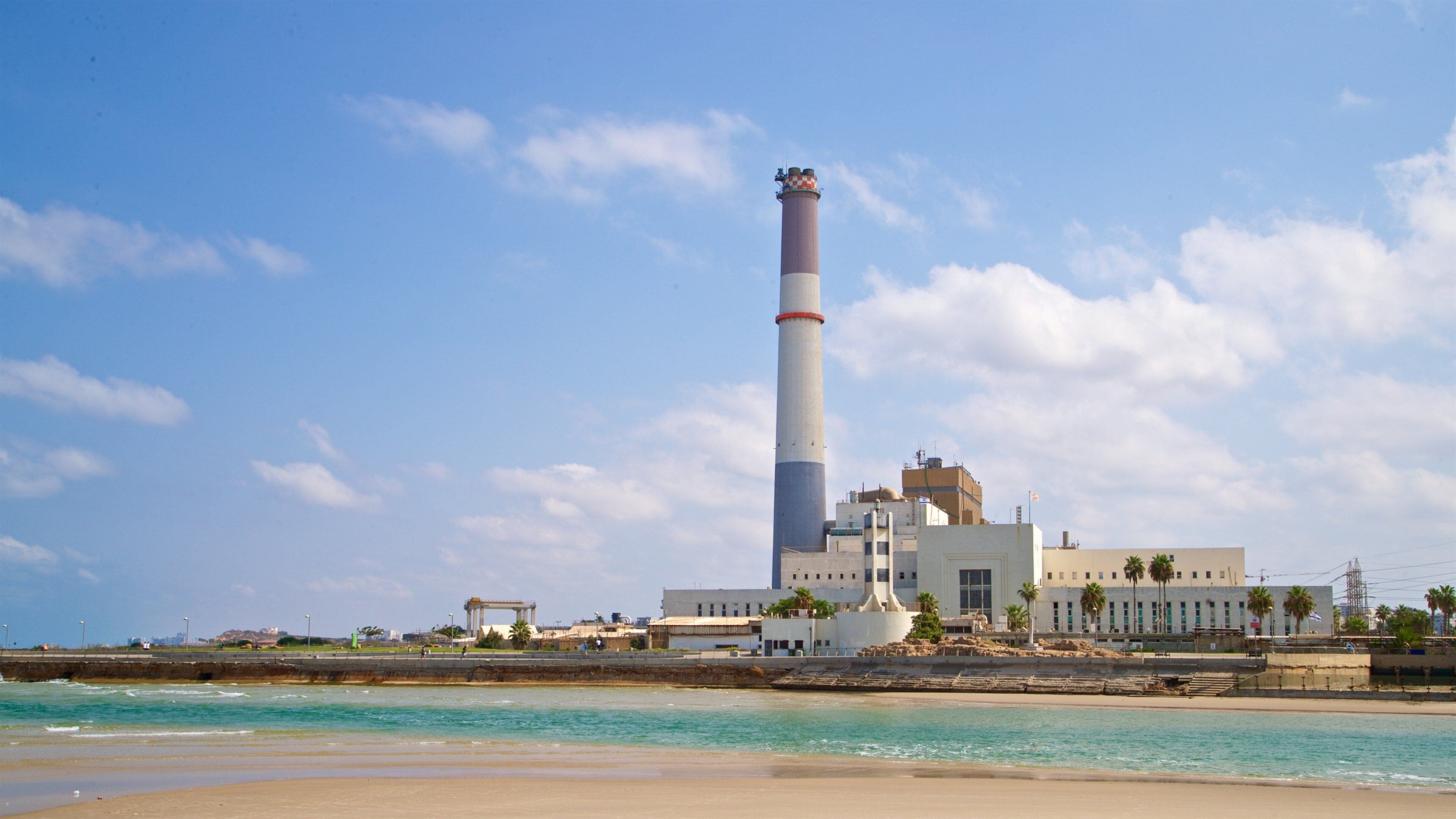 Old Tel Aviv Port which includes general coastal views and a coastal town