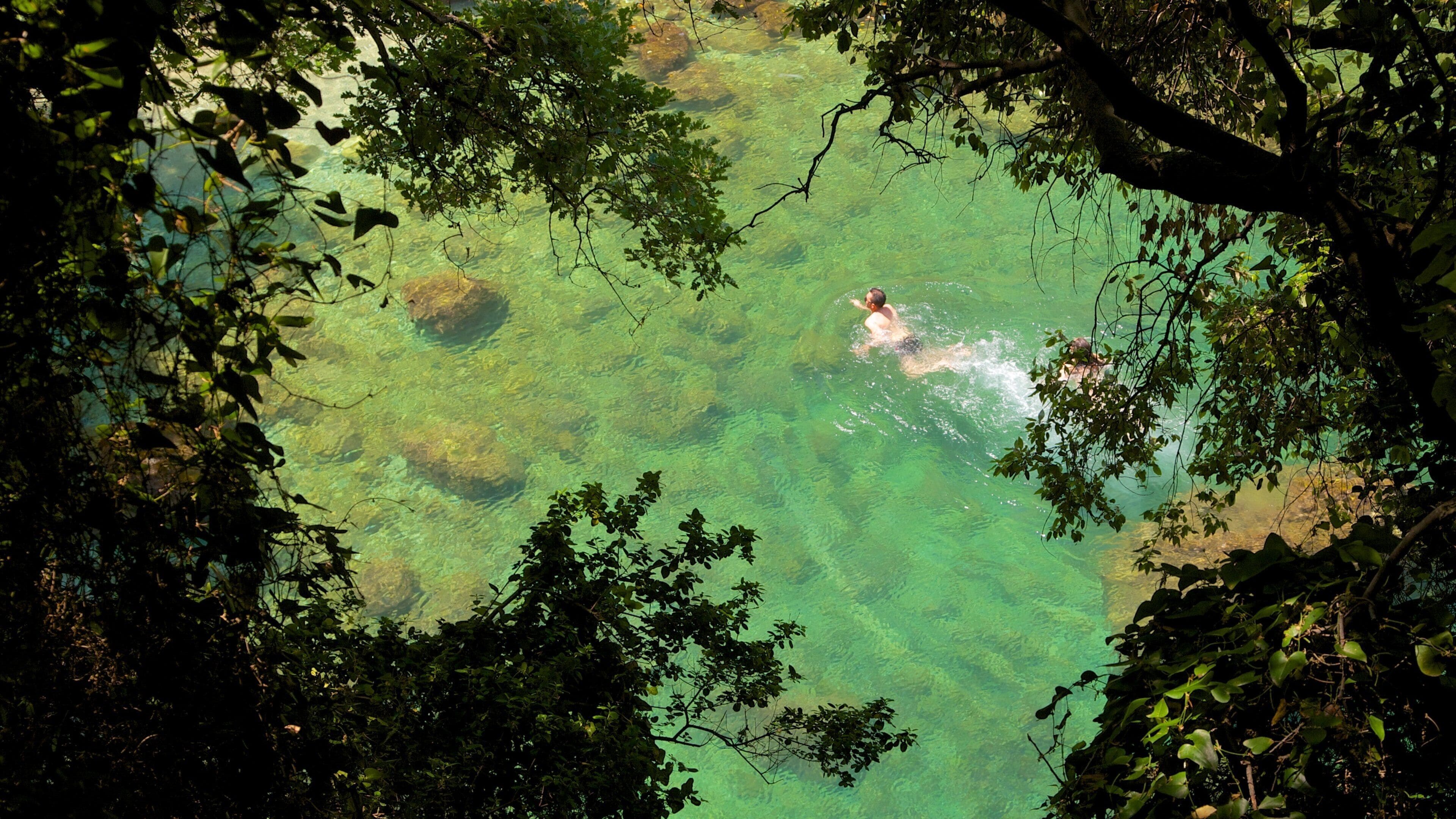 Baths Of Queen Giovanna which includes swimming, landscape views and a lake or waterhole