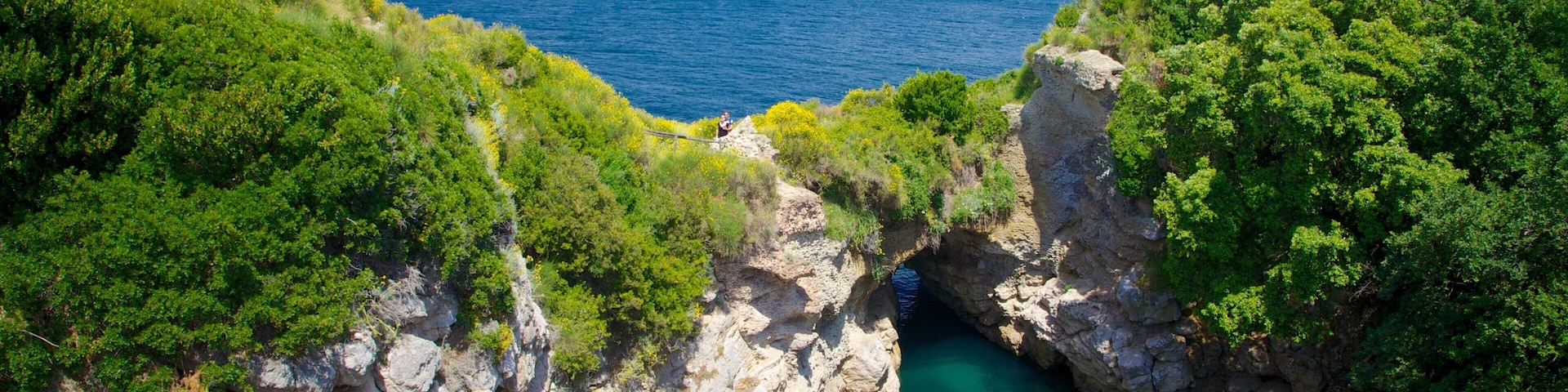 Baths of Queen Giovanna showing rocky coastline