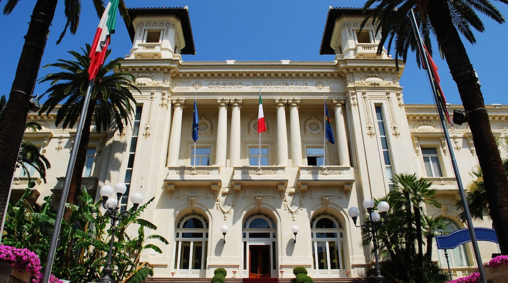 Sanremo casino white facade with palms and flowers; Shutterstock ID 127968323