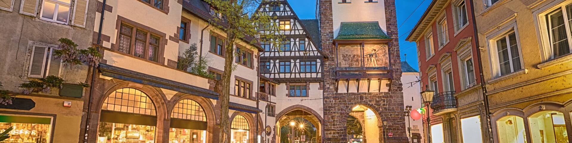 Schwabentor - historical city gate at dusk in Freiburg im Breisgau, Baden-Wurttemberg, Germany