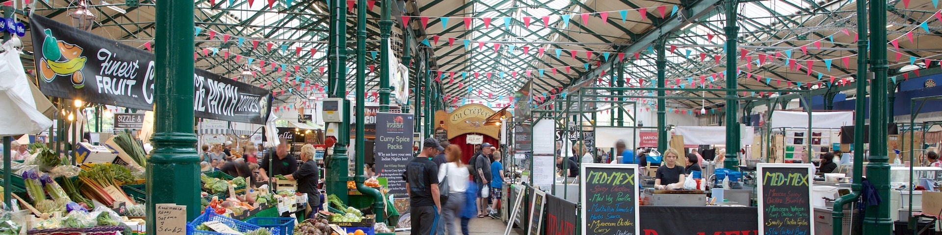 St. George\'s Market featuring markets, signage and a square or plaza