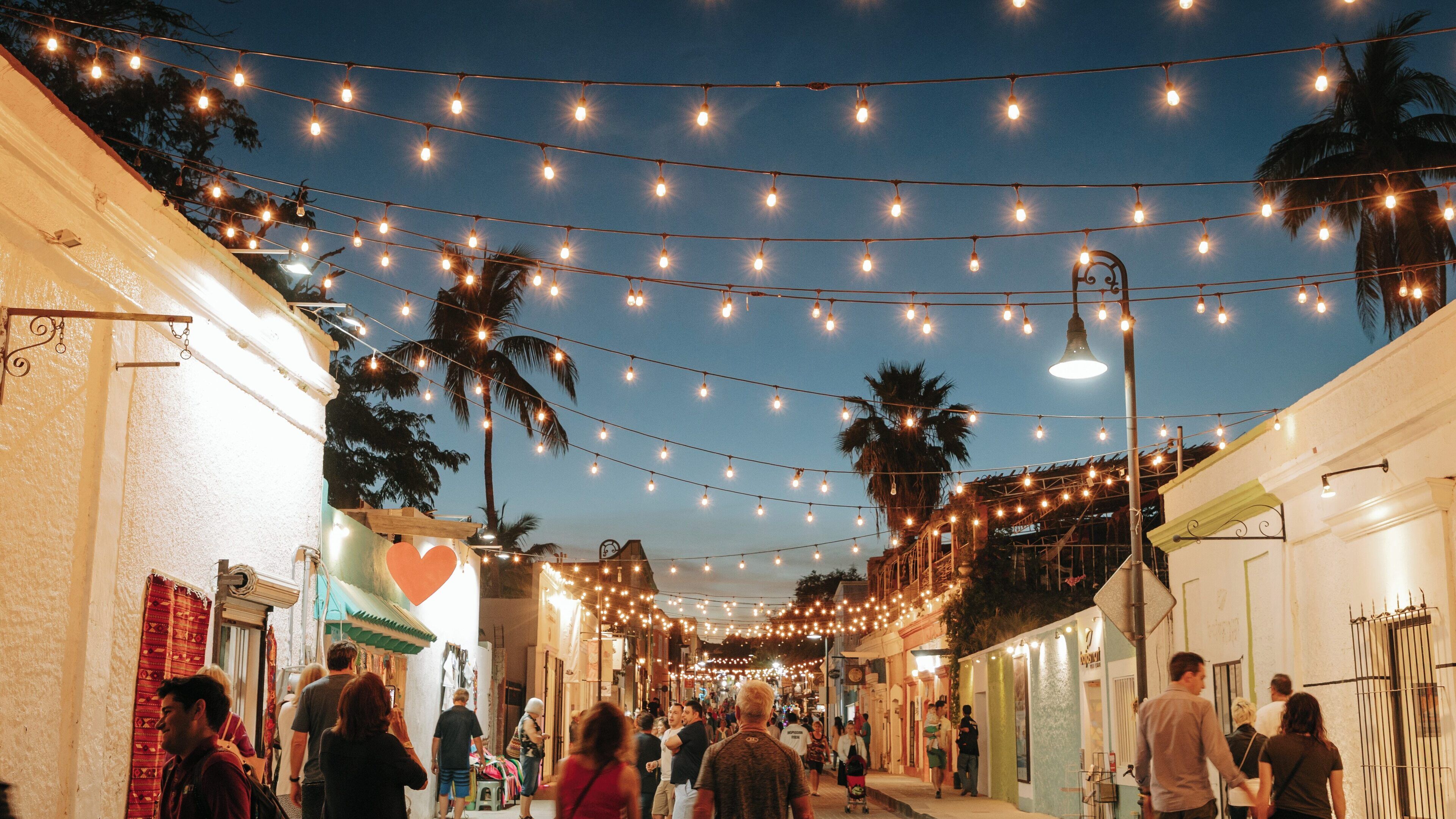 Evening stroll through colorful San Jose del Cabo Art District with festive lights and vibrant atmosphere