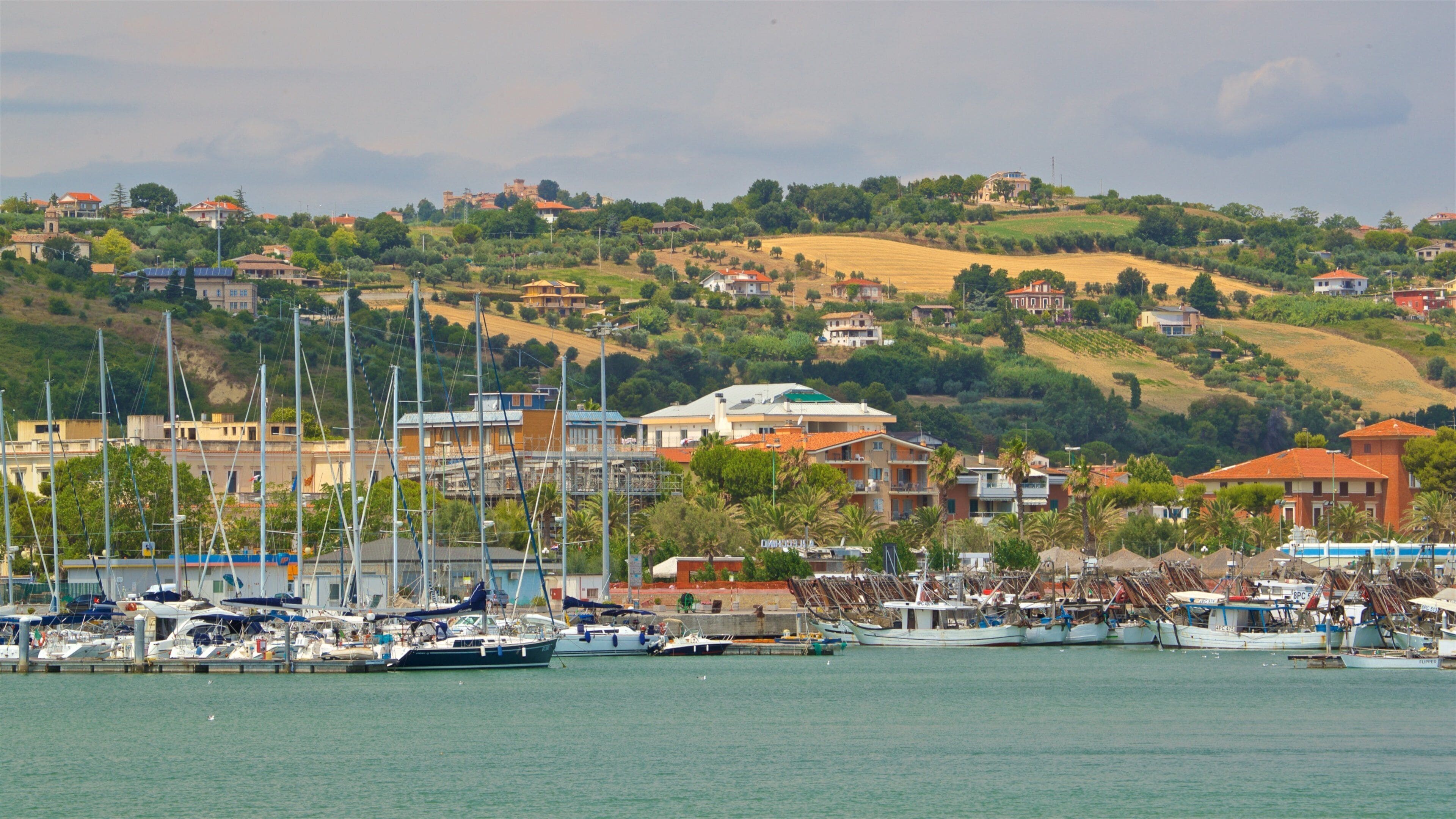 Giulianova Harbor featuring a bay or harbor and a coastal town