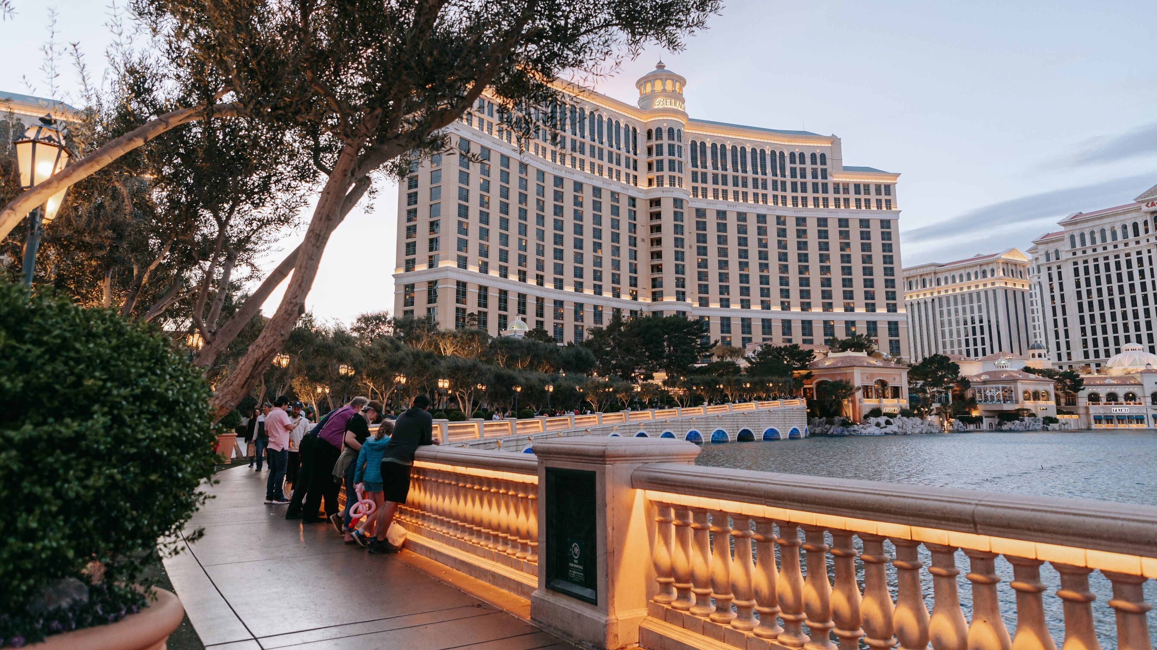 Bellagio Casino featuring a pond, a hotel and street scenes