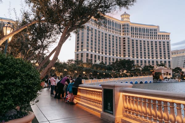 Bellagio Casino featuring a pond, a hotel and street scenes