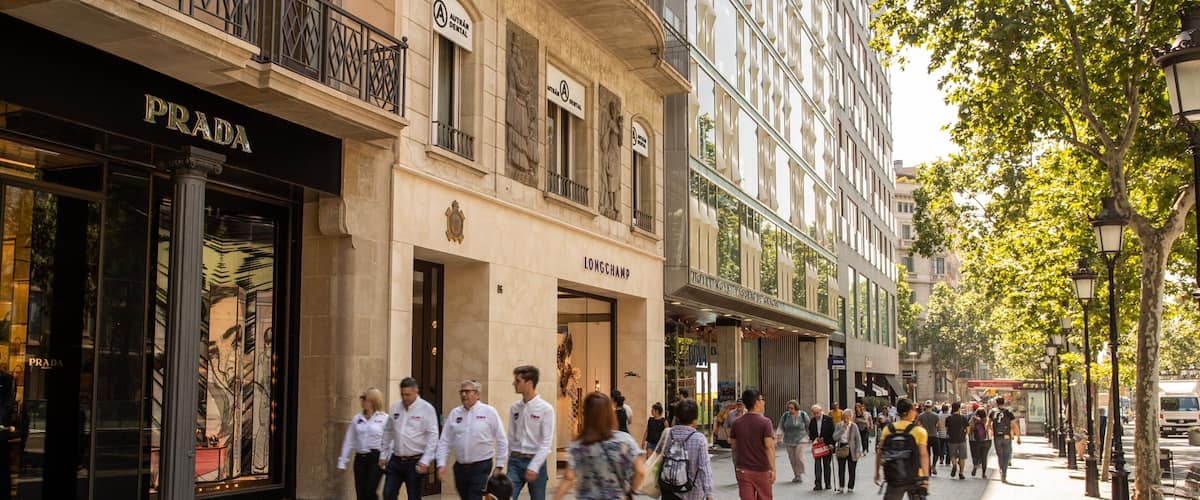 Passeig de Gràcia which includes street scenes and a city as well as a small group of people