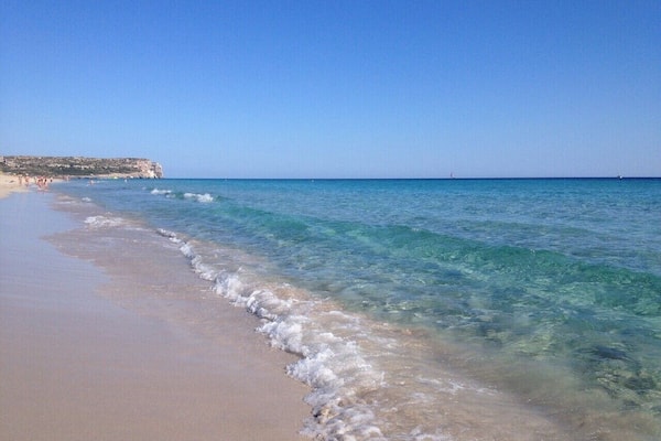 #LifeAtExpedia #Menorca #Spain
Son Bou is the longest beach in Menorca and one of the few open seas on the island. It's one of my favourites to swim and there are several good quality restaurants on the beach with the bonus of a takeaway service :) Towards the rear of the beach is a large protected wetlands area where many species of wild birds can be seen.