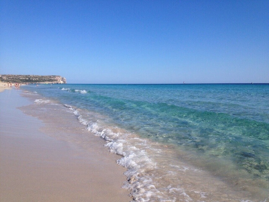 #LifeAtExpedia #Menorca #Spain
Son Bou is the longest beach in Menorca and one of the few open seas on the island. It's one of my favourites to swim and there are several good quality restaurants on the beach with the bonus of a takeaway service :) Towards the rear of the beach is a large protected wetlands area where many species of wild birds can be seen.