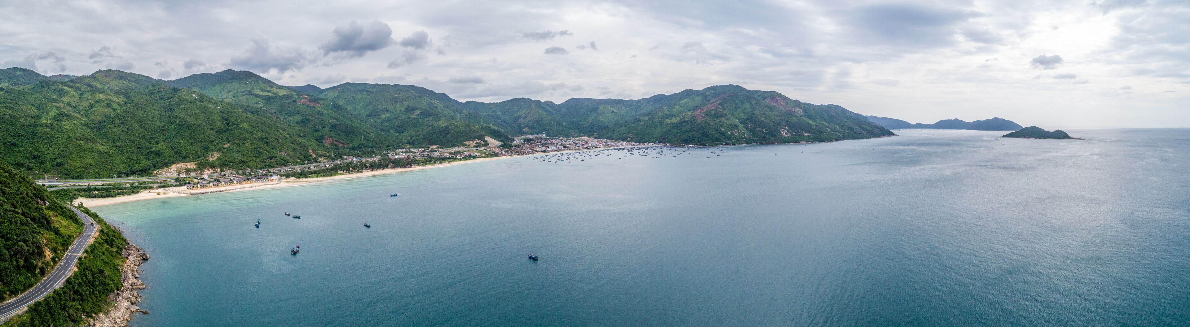 Panorama Aerial view of Dai Lanh beach, Van Ninh, Khanh Hoa. Situated at the south central coast of Vietnam,a two-kilometre bay with a fishing village at one end & a beach at the other